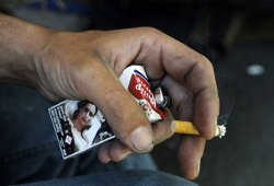 Картинки с последствиями курения появятся на пачках с июля